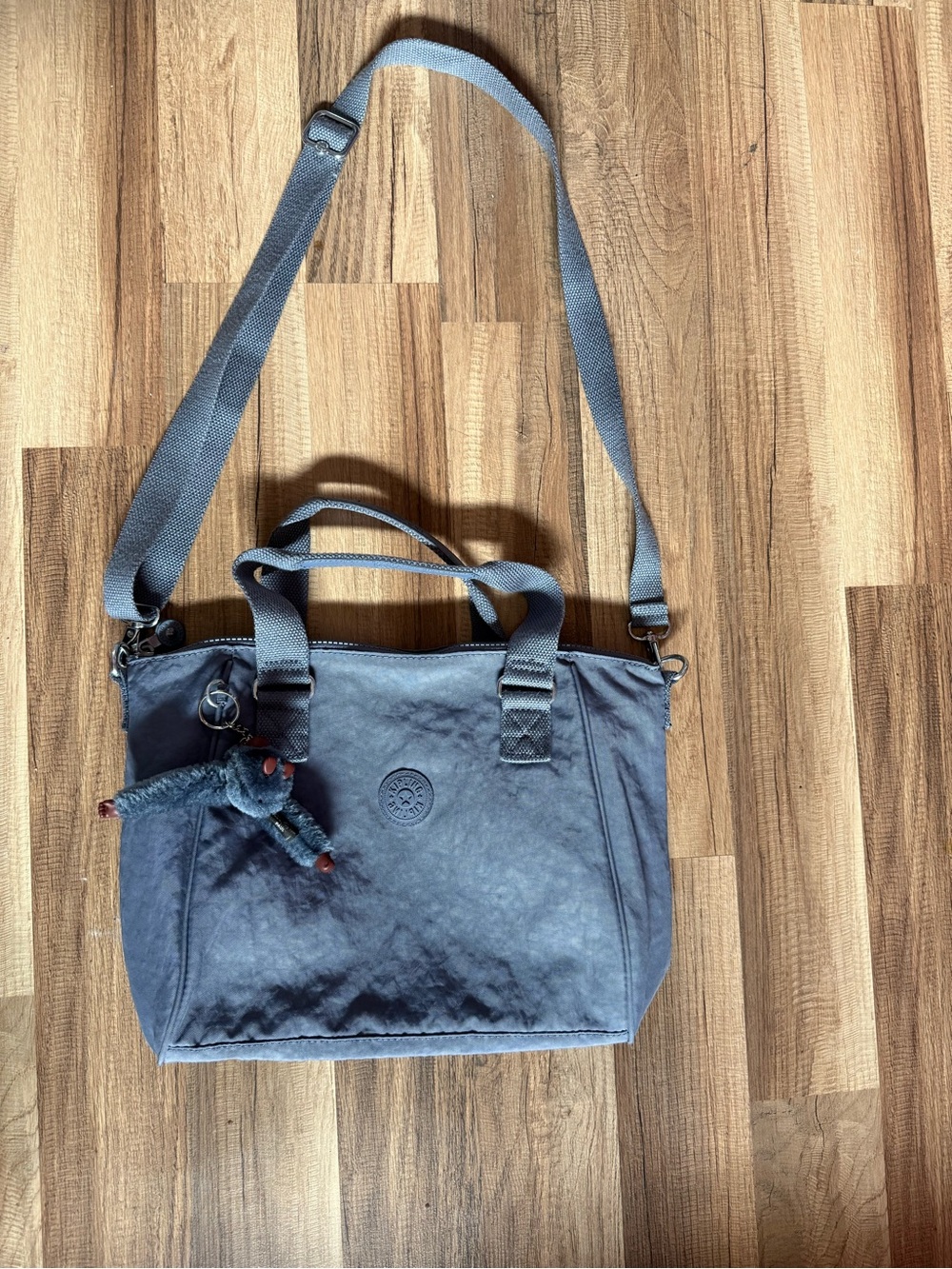 Kipling Slate Blue Compact Messenger Tote with Monkey Charm
